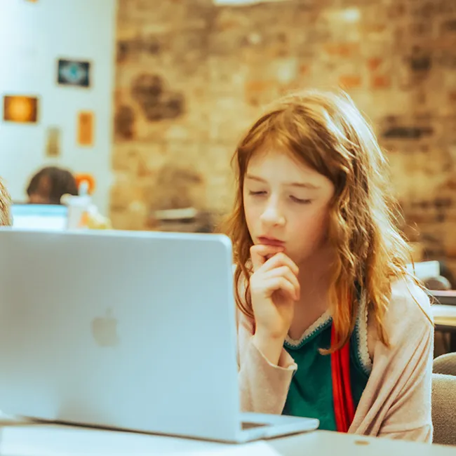 Templeton Academy student working on an assignment