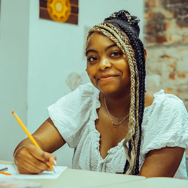 A Templeton Academy student working on an assignment